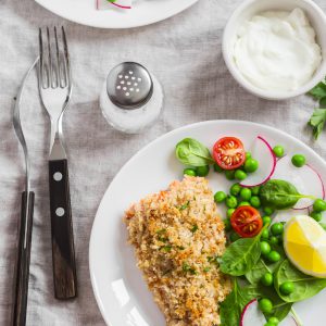 Baked salmon with parmesan and herb crust served with fresh vegetable salad of peas, spinach, radishes and cherry tomatoes. A delicious, healthy dinner that the kids will love!