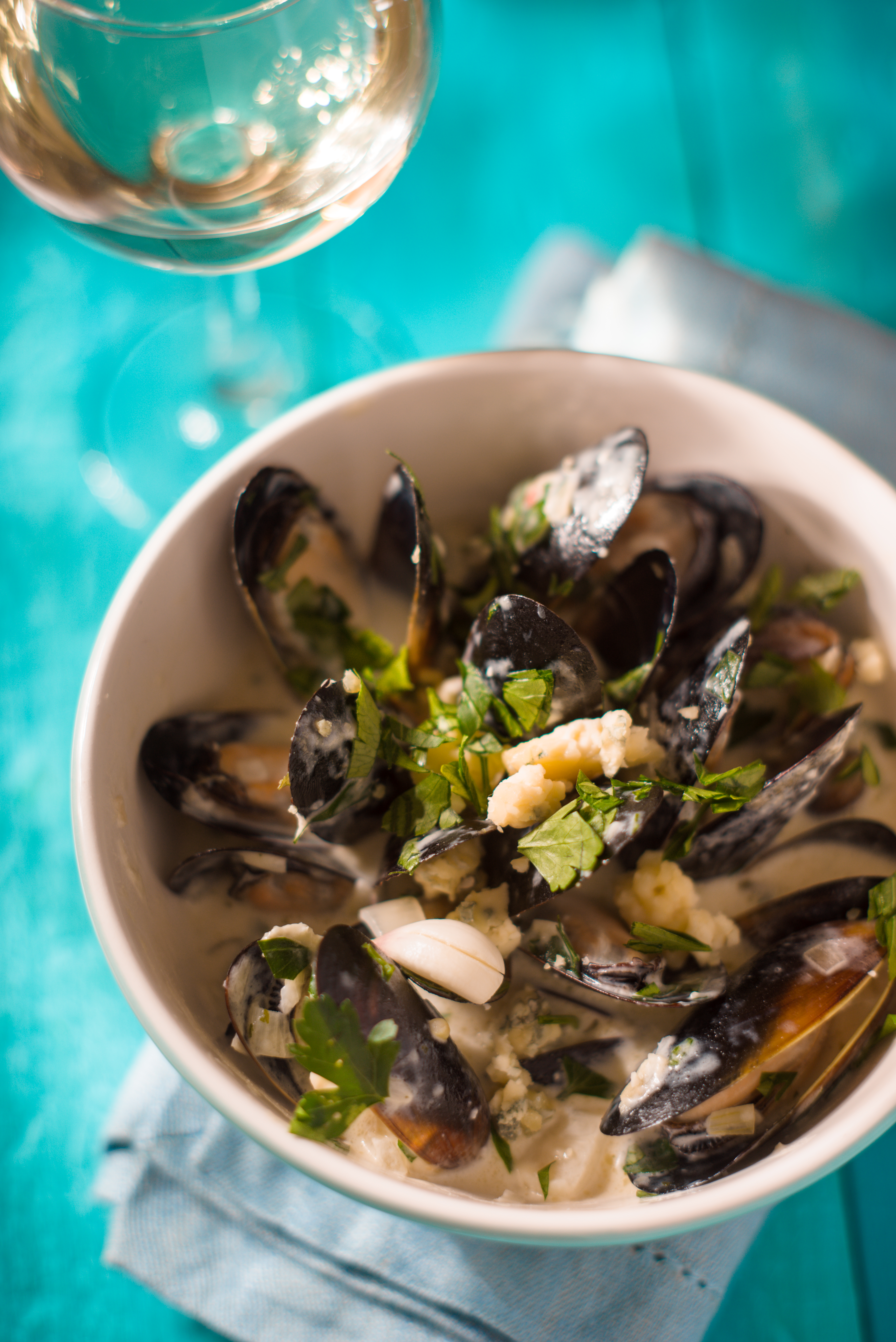 Steamed mussels in white wine, garlic, and herbs.