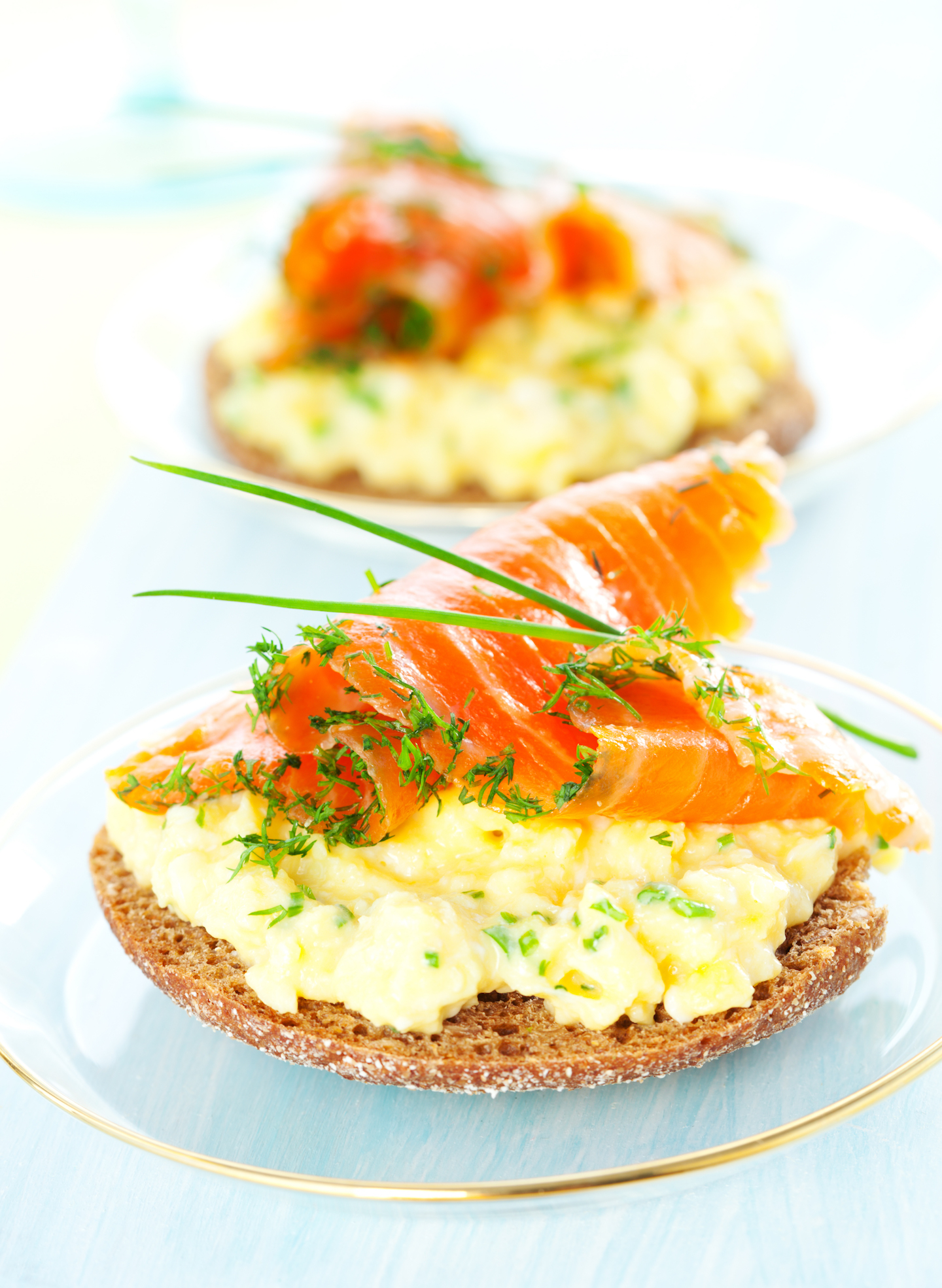 Smoked Salmon Breakfast Sandwich with chives and scrambled eggs